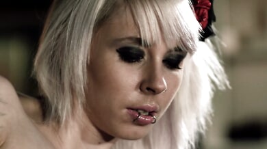 Tattooed German beauty takes strapon control and swallows deep before creampie climax