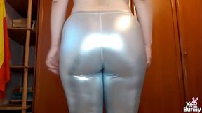 Big ass walking in shiny silver pants