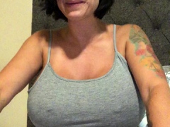 Busty curly brunette with big boobs fucks on couch
