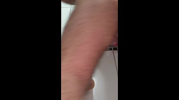 In the bathroom sticking dildos in my ass