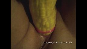 Wife gets an orgasm with corn and vibrator