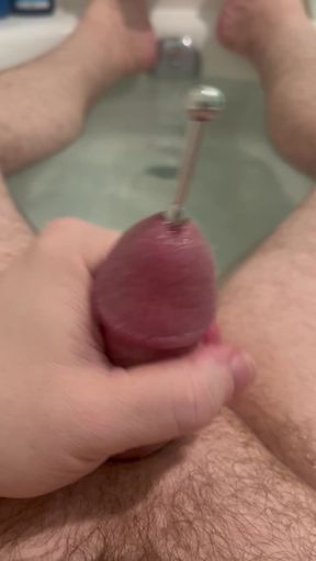 Playing with a Urethral Sound