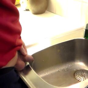 John Is Pissing in the Kitchen Sink