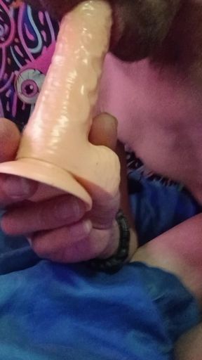 Sucking on my big dildo