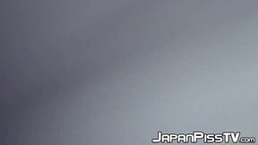 Delectable Japanese babe is peeing outside during day time
