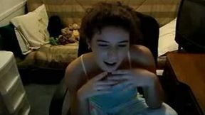 Curly cutie stripping and posing seductively