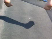 Slow motion jumping on a trampoline in shorts & T-shirt regular woman jumping not a big tit slut