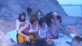 Asian Beauties Fulfill Fantasies with Public Beach Sex