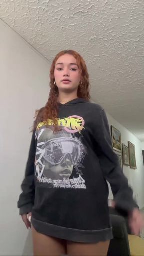 Sexy redhead in black hoodie