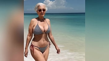 Naughty granny in bikini chats up young stud on the beach