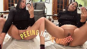 Peeing in the mirror