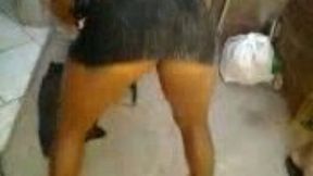 Dark skinned slutty and sporty nympho was taped while posing in black stuff