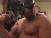 Naked horny muscular cop wearing his police hat turns himself on flexing his big bicep and cums