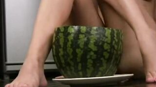 Cute Cristina plays naked with watermelon