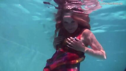 Nikita Vodorezova shows off her sexy body underwater