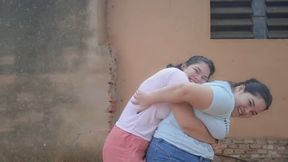Two Big Girls in One Bear Hug Session