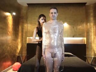 Femdom gal puts her thrall in tape slavery