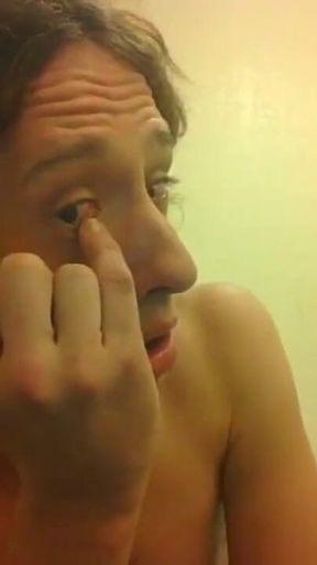 Topless Transgirl Touching Her Eyes