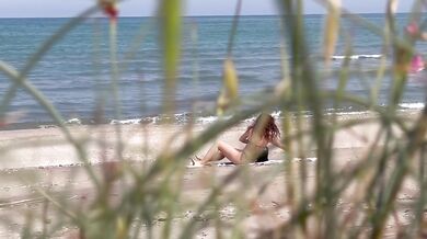 Midday manoeuvers on the sand with those perky tits bouncing as a stranger hands me that big dick