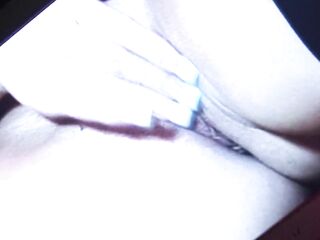 Golden-haired honey and her breasty girlfriends play with their hairless vaginas on the sofa