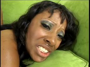 Sexy black whore sucks an enormous black cock