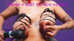 Bondage of milky tits with zip ties