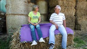 Mature lusty grey haired village slut wanks and sucks dick on straw in shed