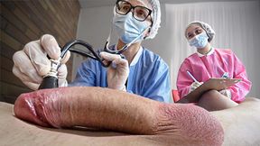 Two Nurses Examine Patient's Enhanced Package with Their Large Derri&#x00E8;res