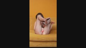 Hot brunette in fishnet