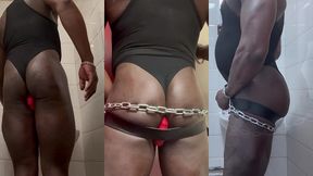 singlet attired black muscle butt chained & plugged