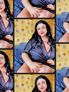 Hot mature brunette with big tits posing