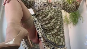 Horny mature stepmom in stockings and high heels masturbates and puts her foot on the desk