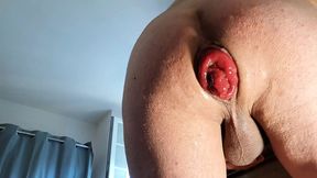 naked in front of the camera, he exposes his ass