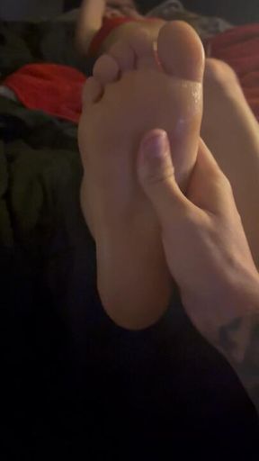 Making him rub my oiled up feet