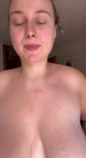 Amateur with big tits shows off her round ass