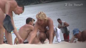 Blonde mature chick is naked at the beach