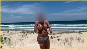 Sweet wife shows off her flawless curves at the beach in her bikini