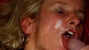Blonde Anneke gets a facial from a big group of cocks