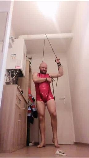 BigSlaveAndreas in Bondage in red Latex