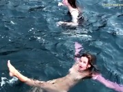 Underwater swimming girls on Tenerife