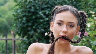 Pigtailed beauty Vixi Rafi fingering herself in a field