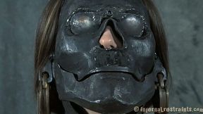 Young and sexy babe tries on a freaky mask