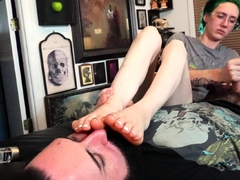 Brunette with foot fetish rubs big dick with her feet in POV