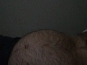 pregnant man with hairy belly in labor.