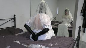 Handcuffed and ballgagged bride