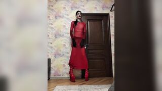 Sissy slut poses in a chastity belt and with a plug