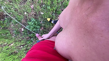 I jerk off his dick and help him pee in public