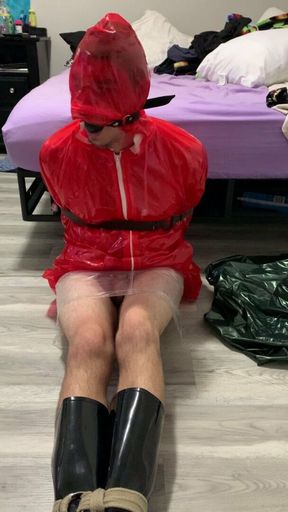 Red plastic raincoat bondage