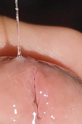 Wide Hole Filled with Pre Cum in Close up