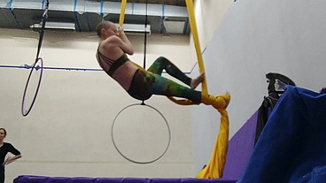 Practicing 'candycane' on silks